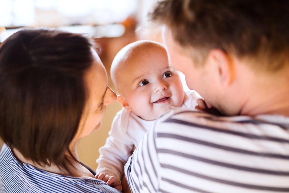 child developing looking at parents